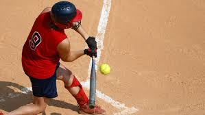 how to fix swinging under the ball